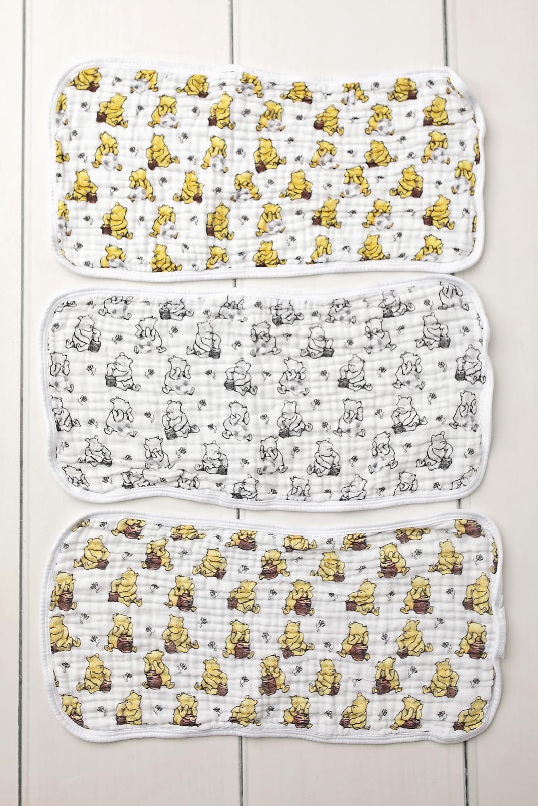 Sugar Lily's-Classic Pooh Muslin Cotton Burp Cloth Set. 1 of Each- Full Color,Design, Full Color w/Soccer Ball Motifs, Black & White Design w/Soccer Ball Motif.