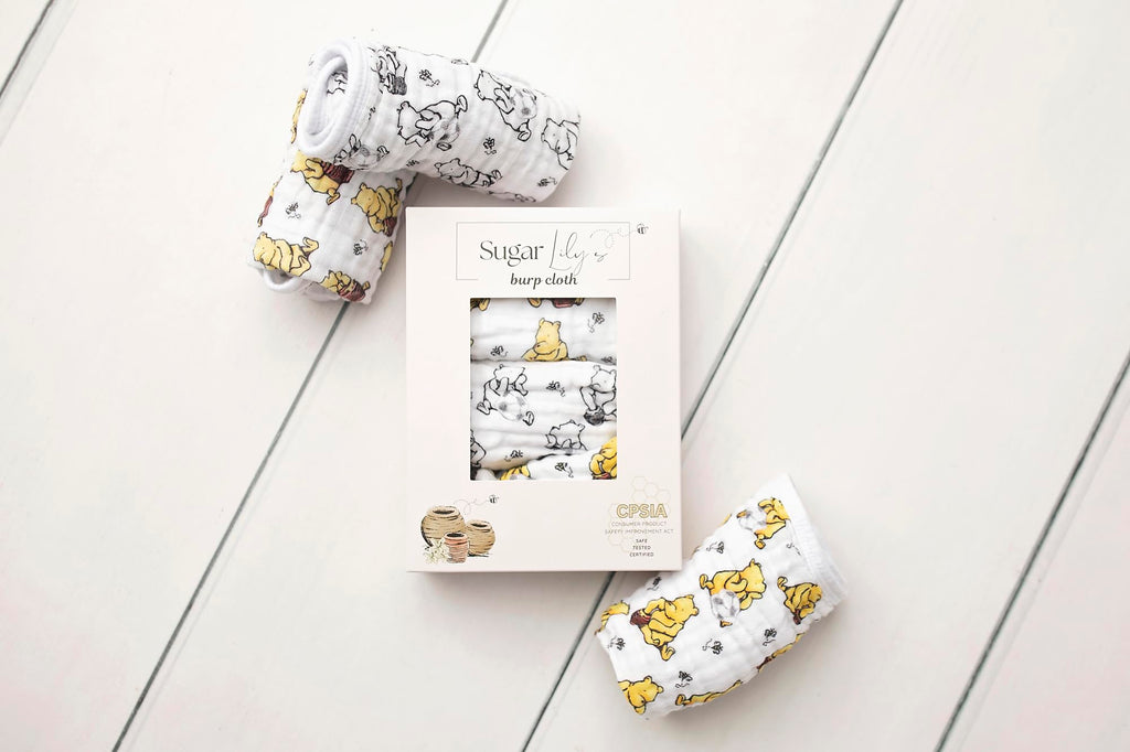 Sugar Lily's-Classic Pooh Muslin Cotton Burp Cloth Set. 1 of Each- Full Color,Design, Full Color w/Soccer Ball Motifs, Black & White Design w/Soccer Ball Motif.